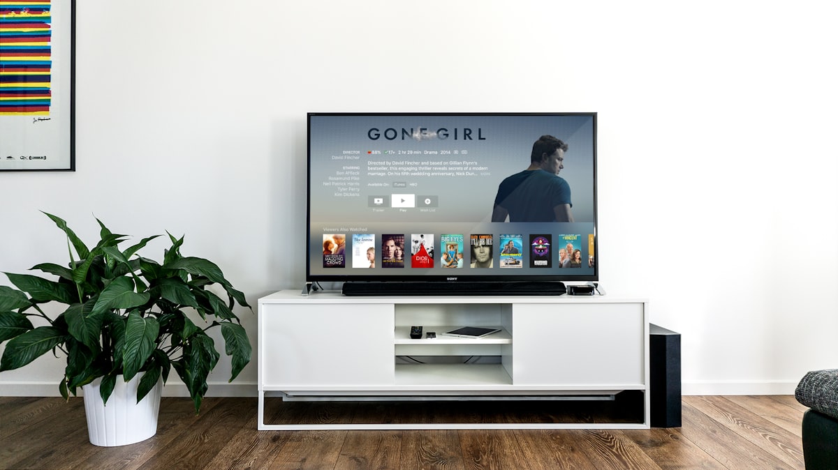 Living room with television on, illustrating the use of IPTV on a Roku box.