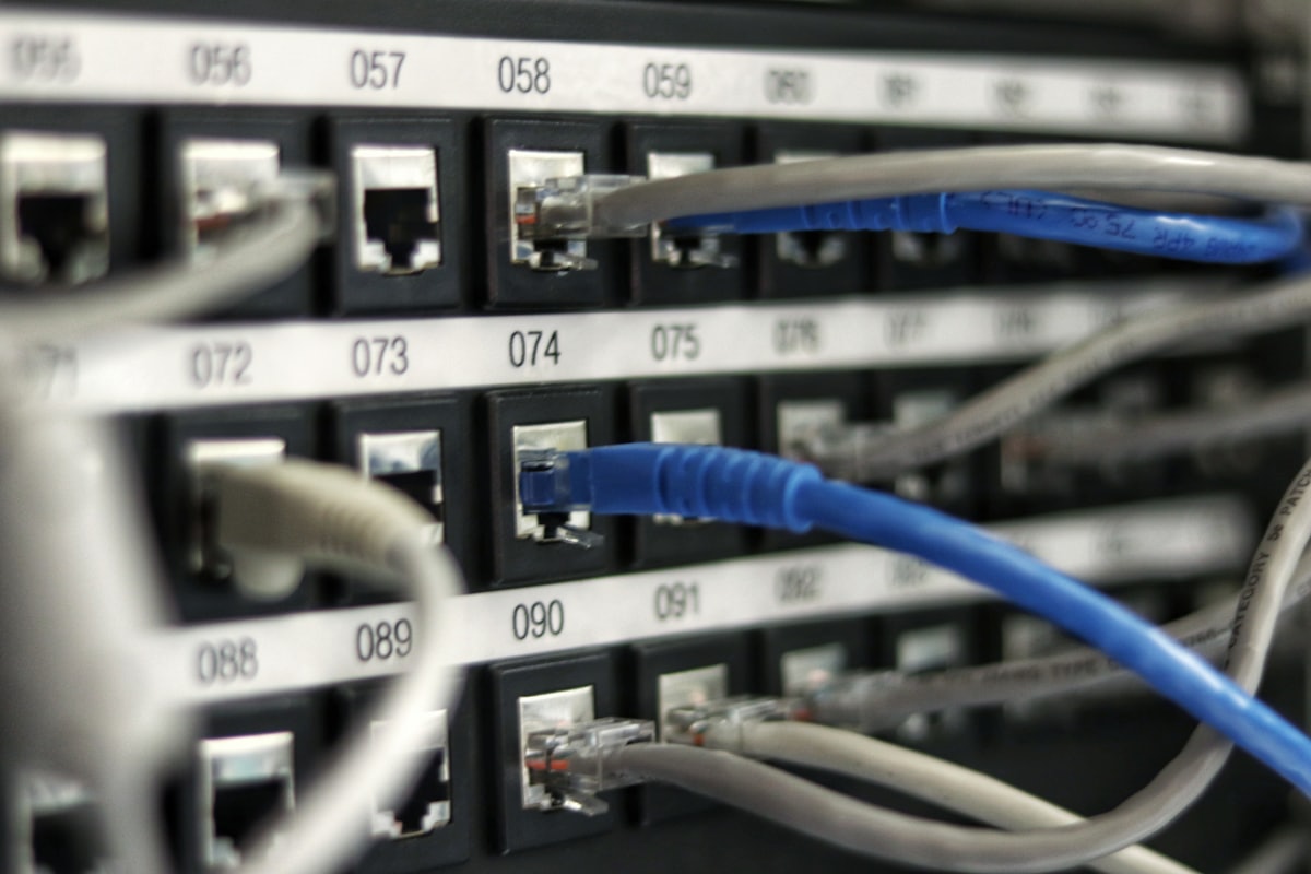 Network cables connected to a router, showing the internet speed needed to watch 4K IPTV.